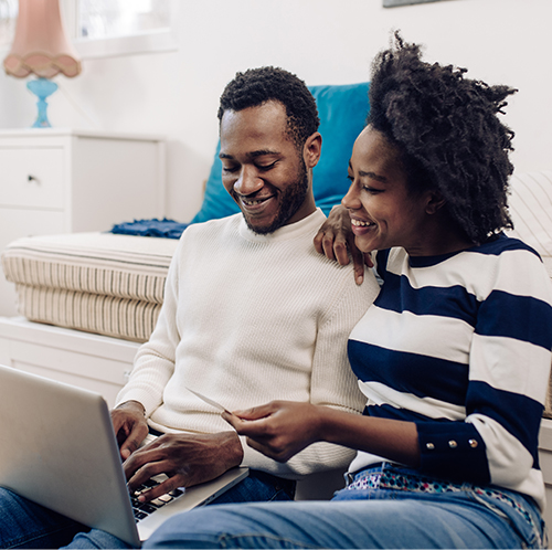 couple looking at computer