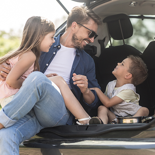 family in car